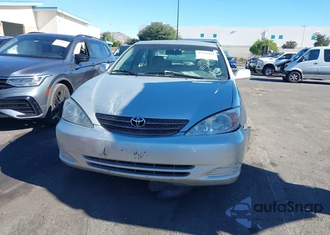 2003 Toyota Camry Le z USA, uszkodzony, nr VIN 4T1BE32K43U194647